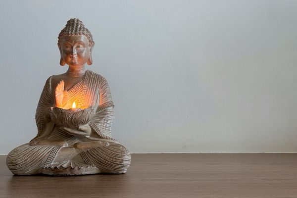 Quiet room for meditation with soft pink lighting.